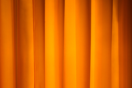 the curtain filters the sun lightの写真素材