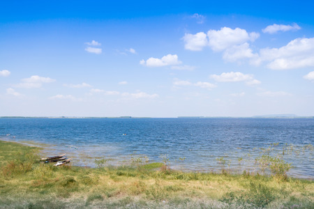 Landscape with river and blue skyの写真素材