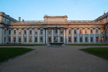 Enrance of a palace with columns and fountainの写真素材