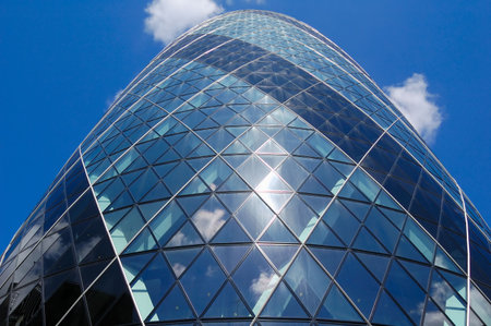 Vertical view of the Gherkin skyscraper with a blue sky backgroundのeditorial素材