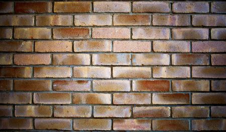 Old wall with dirty dark bricks