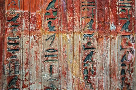 Ancient egyptian hieroglyphs engraved in stone