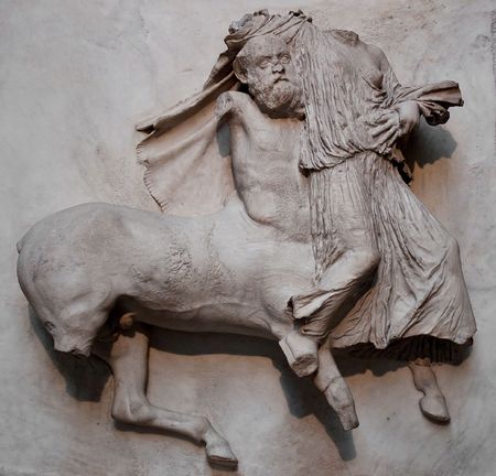 Sculpture from the Parthenon representing a centaur kidnapping a womanの写真素材