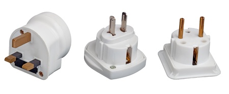 Three different electrical adapters isolated on a white background