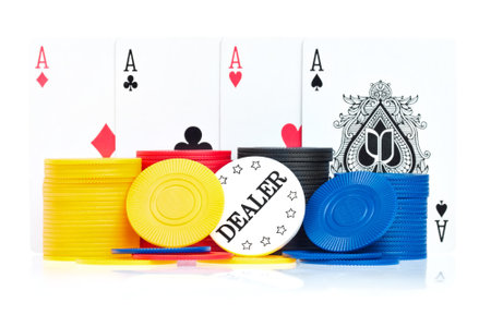Four aces, poker chips and dealer button on a white backgroundのeditorial素材