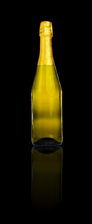 Bottle of champagne or cava isolated on black with reflection (with clipping path)の写真素材