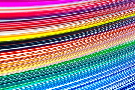 Macro shot of a stack of colorful paper sheets
