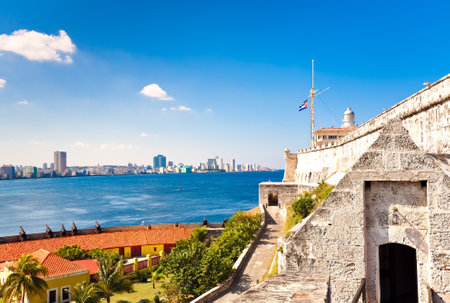 The castle and lighthouse of El Morro in Havana with a view of the city in the backgroundのeditorial素材