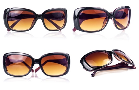 Set of modern sunglasses on a white background