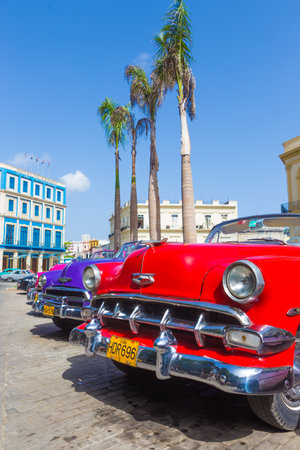 Antique red chevrolet and other vintage american cars on June 21, 2013 in Havana These classic cars are a worldwide famous sight and a tourist attraction of the islandのeditorial素材