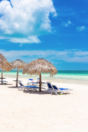 Umbrellas at a tropical beach at Coco Key  Cayo Coco  in Cubaの写真素材
