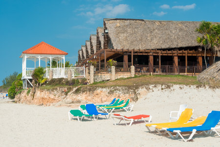 Seaside restaurant and beach beds on the beautiful Varadero beach in Cubaのeditorial素材