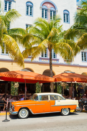 MIAMI,USA - MAY 21,2014 : Vintage car parked at Ocean Drive in Miami Beach, Florida. Art Deco architecture in South Beach is one of the main tourist attractions in Miamiのeditorial素材