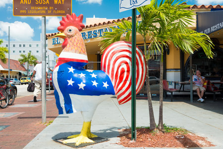  Symbolic rooster sculpture with the colors of the cuban and the american flag at Calle Ocho in Little Havanaのeditorial素材