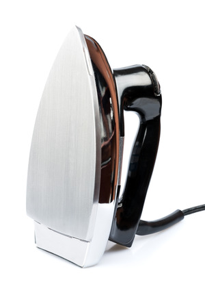Iron, small home  electrical appliance, isolated on a white の写真素材