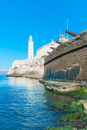 The fortress of El Morro in Havana with an old spanish cannons battery on the foregroundのeditorial素材