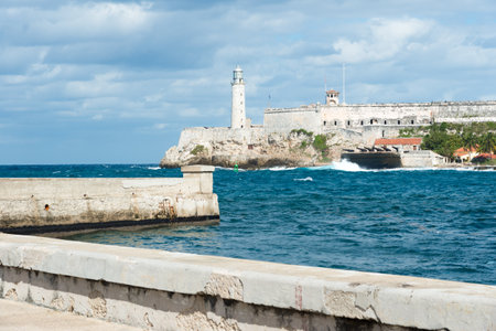 The castle of El Morro and the Malecon wall, two symbols of the city of Havanaのeditorial素材