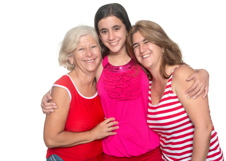 Three generations of hispanic women isolated on a white background