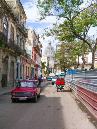 Street scene in Old Havana with the Capitol building in the backgroundのeditorial素材