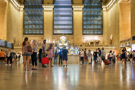 Tourists and travelers at the famous Grand Central Terminal train station in New Yorkのeditorial素材