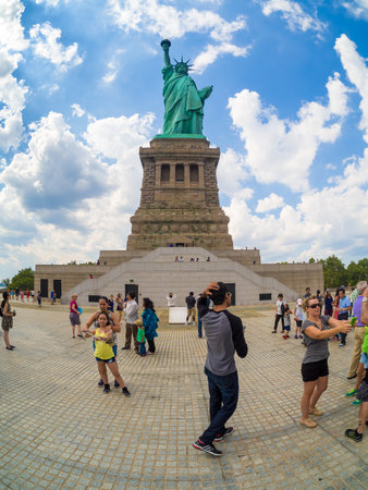 Tourists at the Statue of Liberty in New York Cityのeditorial素材