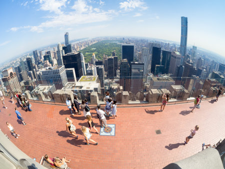 Tourists at the Top of the Rock observation Deck atop the GE Building in New York Cityのeditorial素材