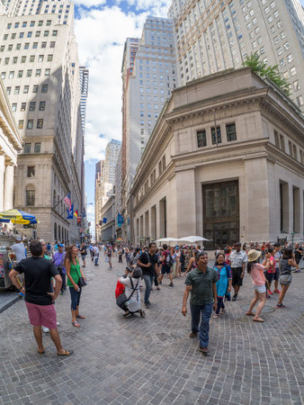 Tourists in Wall Street at Manhattan's Financial District in New York Cityのeditorial素材