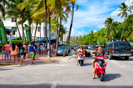 Colorful summer day at Ocean Drive, a popular tourist destination and home of several famous hotels, restaurants and discos in Miami Beachのeditorial素材