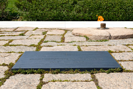 The Eternal Flame and the President John F. Kennedy tombstone at Arlington National Cemetery near Washington D.C.の写真素材