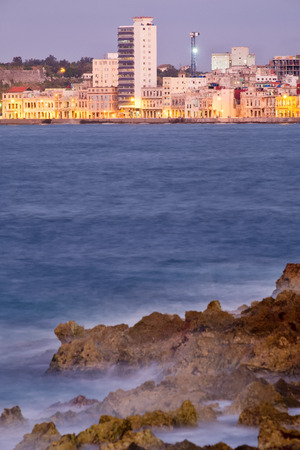 Vertical view of the skyline of the city of Havana in Cuba at sunsetの写真素材