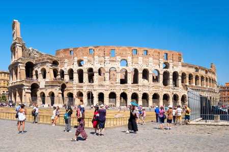 Visitors outside the Colosseum in Rome on a sunny summer dayのeditorial素材