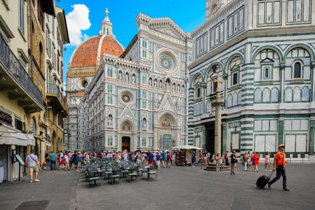 FLORENCE,ITALY - JULY 22,2017 : Tourists at Piazza del Duomo with a view of the Cathedral of Florenceのeditorial素材