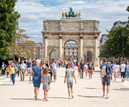 Locals and tourists at the Tuileries Garden on a summer day in Parisのeditorial素材
