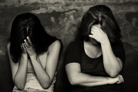 Family problems - Mother and her teenage daughter crying