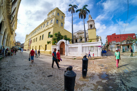 Street scene in Old Havana with people and decaying buildingsのeditorial素材