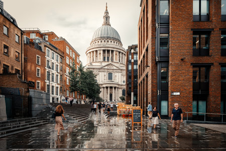Saint Paul Cathedral in London on a rainy day with reflections on the floorのeditorial素材