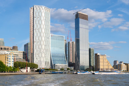 Thames Clipper catamarans at the Canary Wharf pier on the river Thames in Londonのeditorial素材