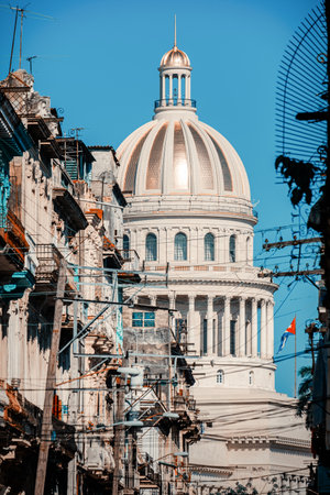 Old colorful buildings in Havana on a street leading to the iconic Capitol, a symbol of the cityのeditorial素材