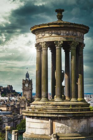 Gloomy view of the city of Edinburgh in Scotland on an cloudy winter dayの写真素材