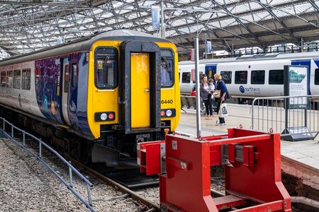 Trains at the platforms on Liverpool Lime Street railway stationの写真素材