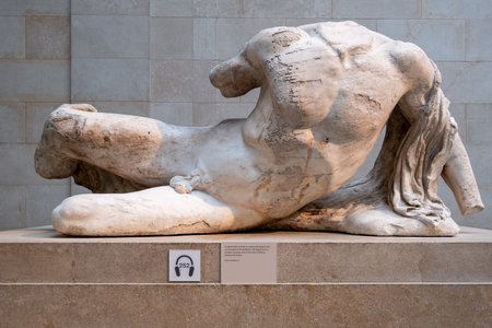 Ancient greek statue from the Parthenon exhibited at the British Museum in Londonのeditorial素材