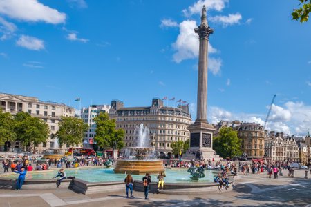 Trafalgar Square and the Nelson Column in London on a beautiful summer dayのeditorial素材