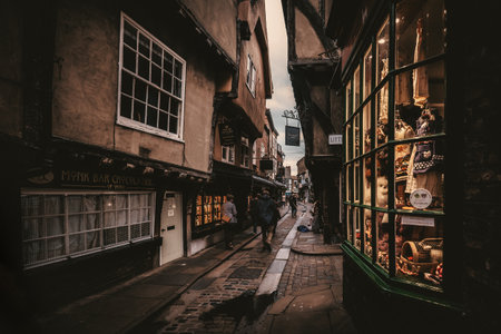 The Shambles, an old street in York with overhanging timber-framed medieval buildingsのeditorial素材