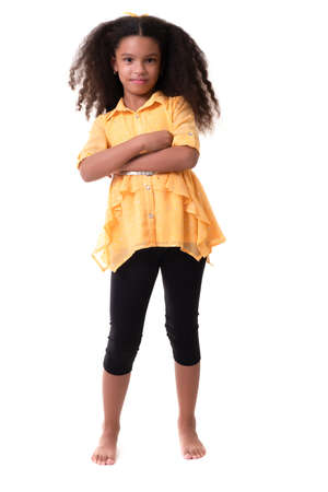 Portrait of a trendy multiracial small girl isolated on a white backgroundの写真素材
