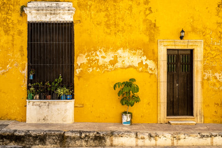 Old yellow house at the magical town of Izamal in Mexicoの写真素材