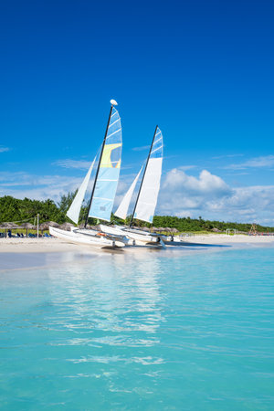 Sailboats on the beautiful beach of Varadero in Cubaの写真素材