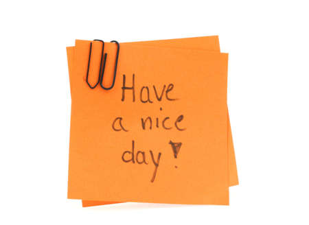 two post-it notes with handwritten HAVE A NICE DAY on themの写真素材