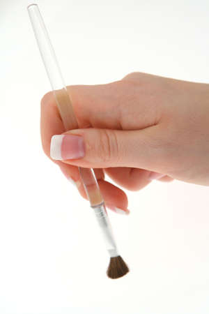 female hand with paintbrushの写真素材
