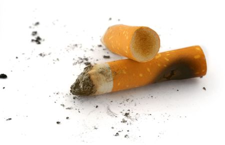 real close-up of two cigarette butts and ashes