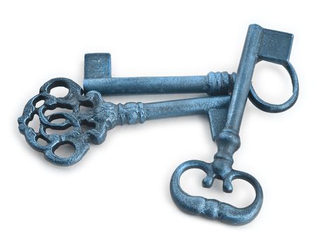 old keys in blue tones against white background, natural shadow underneathの写真素材